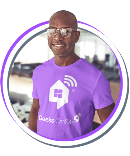a Geeks on Site employee wearing a purple shirt and surrounded by a purple circle graphic.