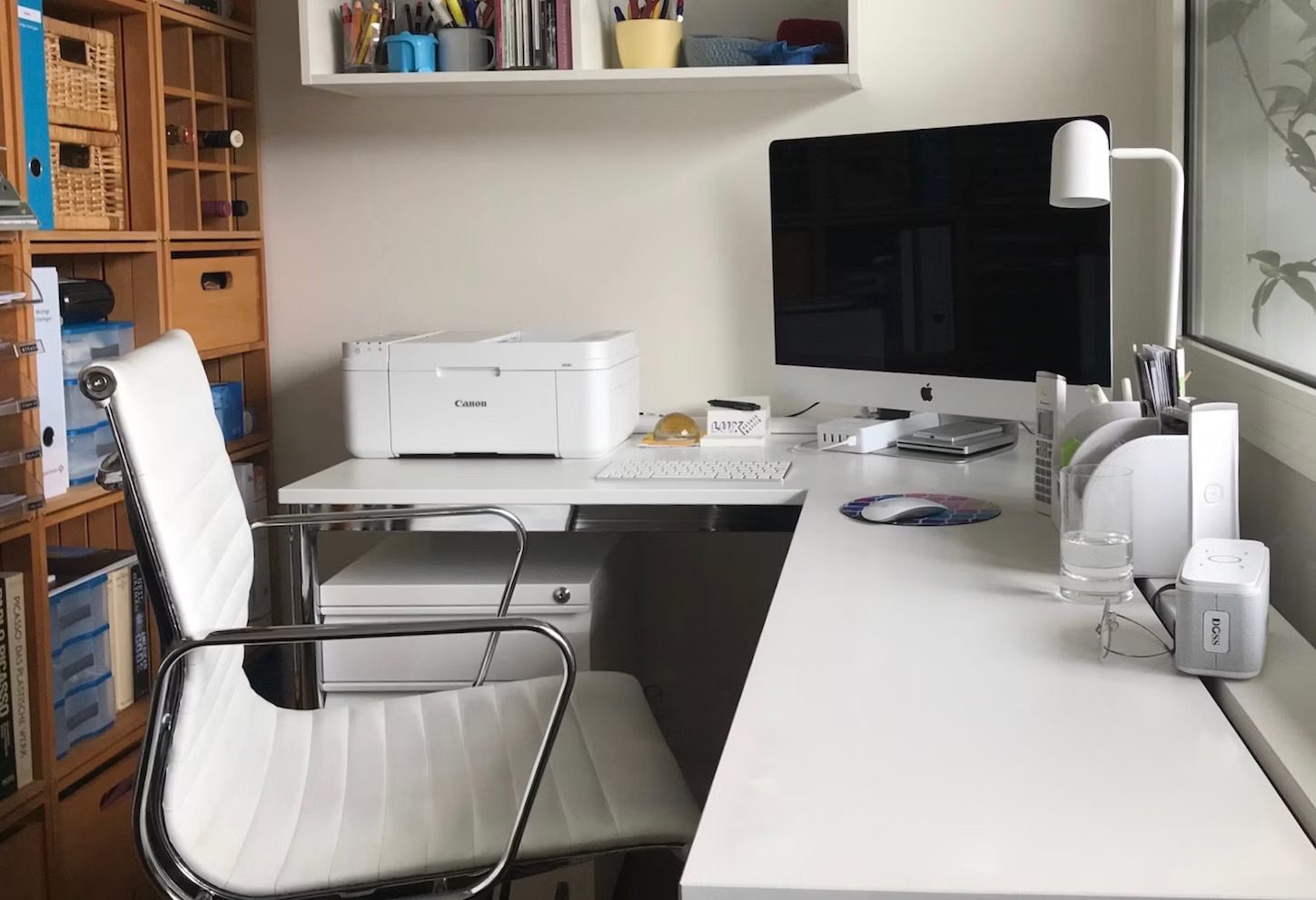 Mac and printer on office desk