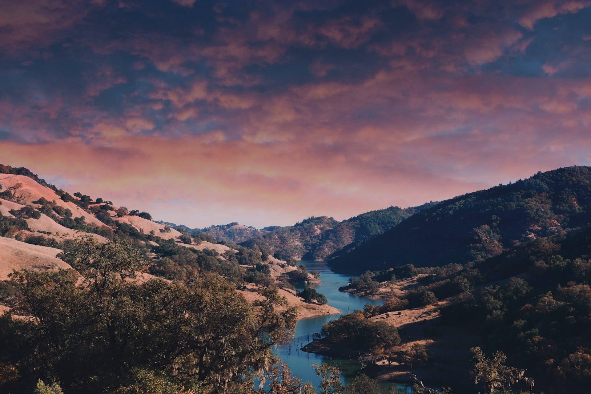 Lake surrounded by mountains at sunset in Sonoma, California.