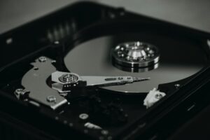 A black and silver hard disk drive.