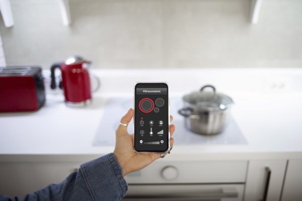 young-woman-using-home-technology-1-scaled