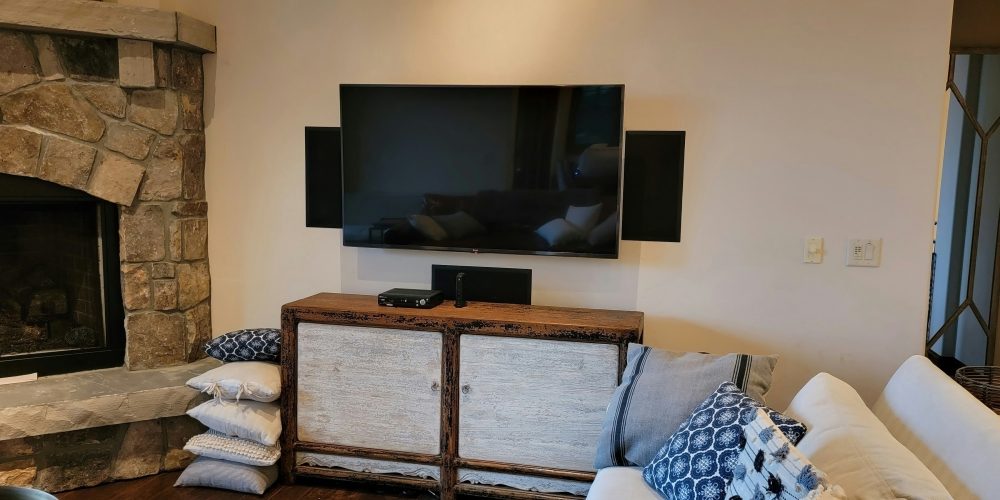 tv mounted on wall