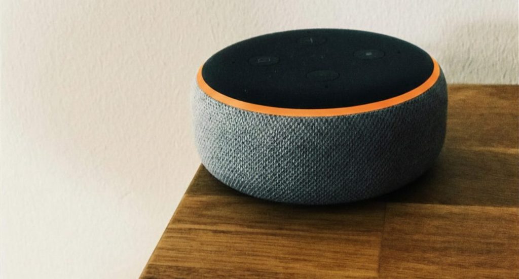 Echo Dot orange light displayed on an Echo Dot speaker while connecting to Wi-Fi
