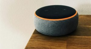 Echo Dot orange light displayed on an Echo Dot speaker while connecting to Wi-Fi