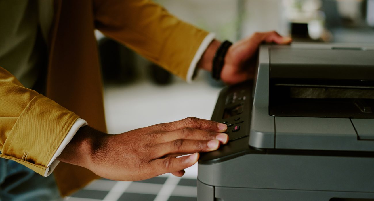 Pressing the power button to wake a wireless printer from sleep mode before printing