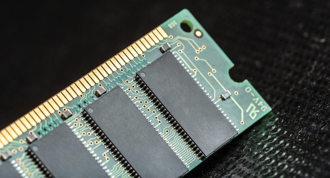 Close-up of a RAM stick showing computer memory chips used for multitasking and system performance