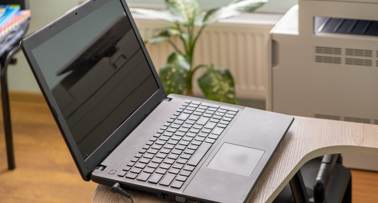 Lenovo laptop connected to its charger while checking battery and power issues