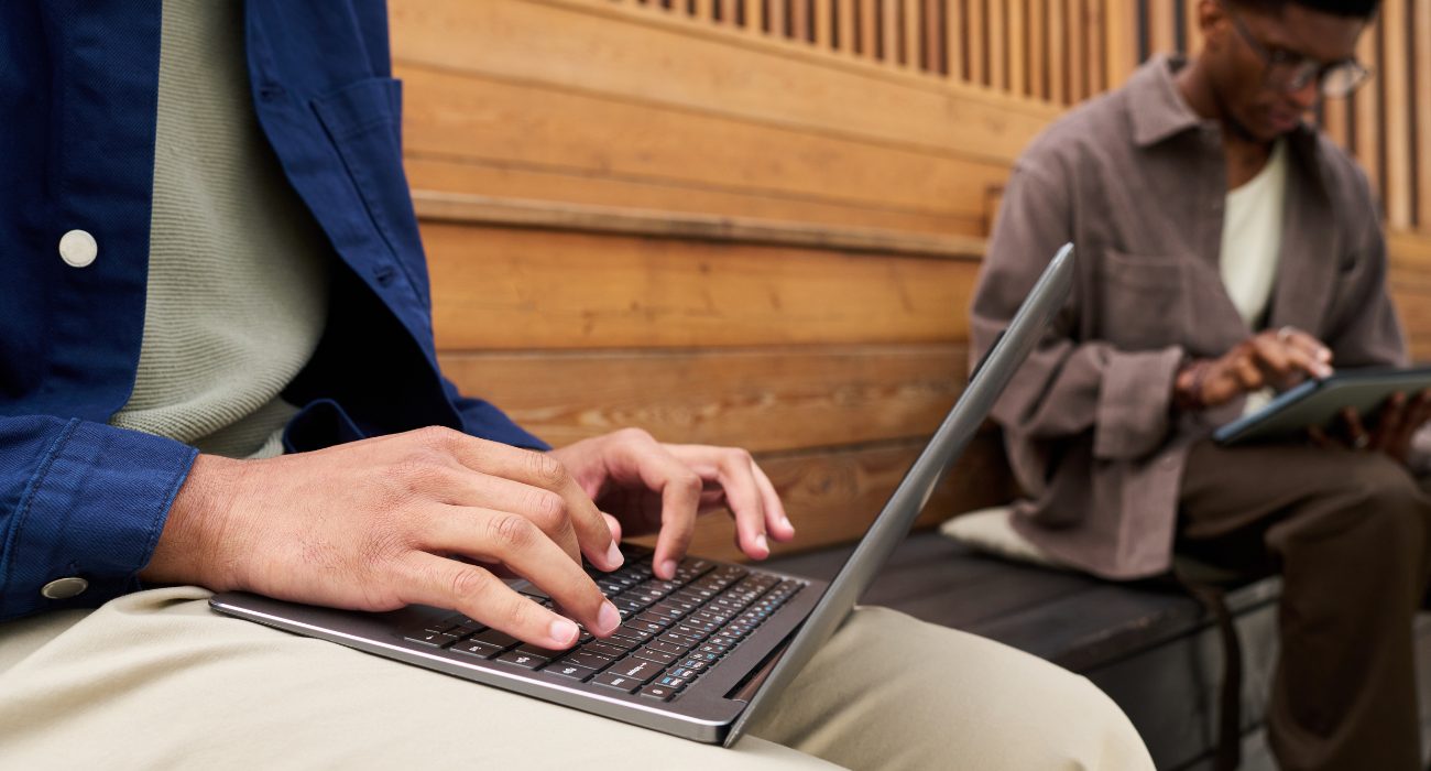 Person updating Lenovo laptop drivers and BIOS to troubleshoot unexpected shutdowns